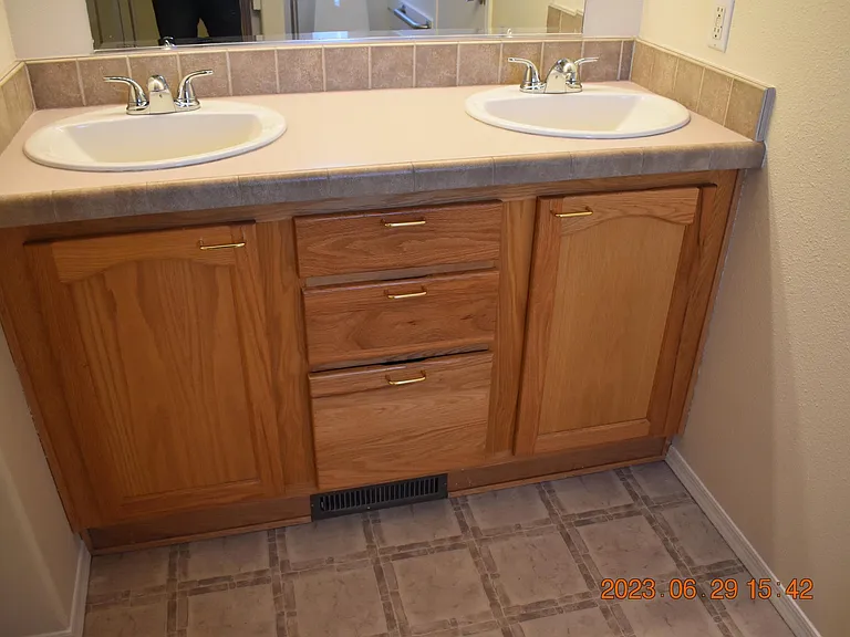 Master bath sinks and cabinets.