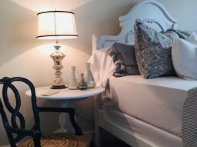 Second guest room with queen bed.