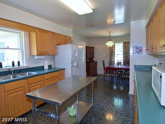 Alternate view of kitchen to dining space.