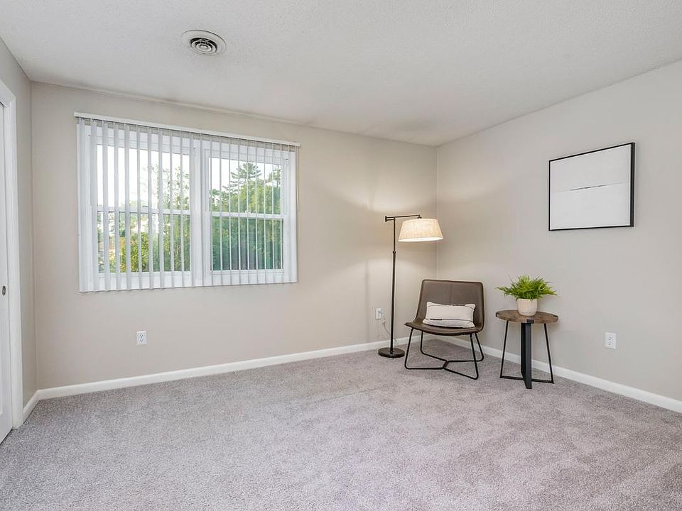 Spacious bedrooms featuring plush carpeting and closets with organizers.