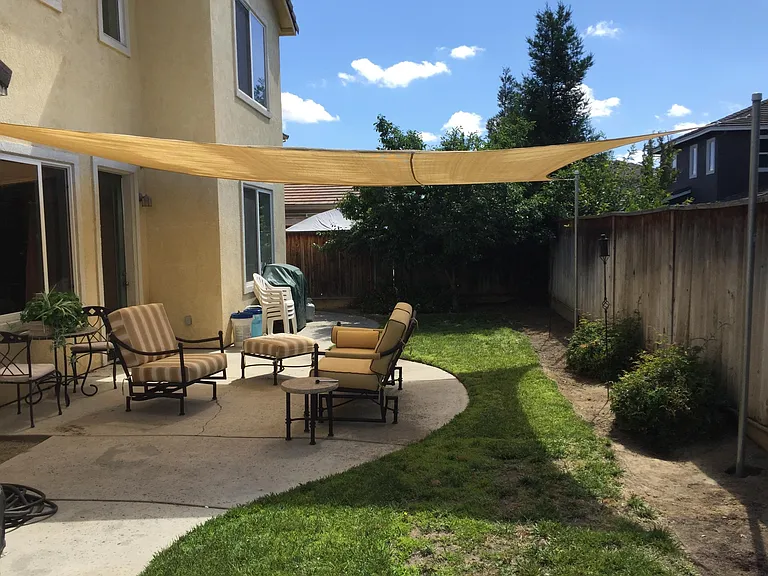 Low-maintenance backyard with sapce for outdoor entertaining