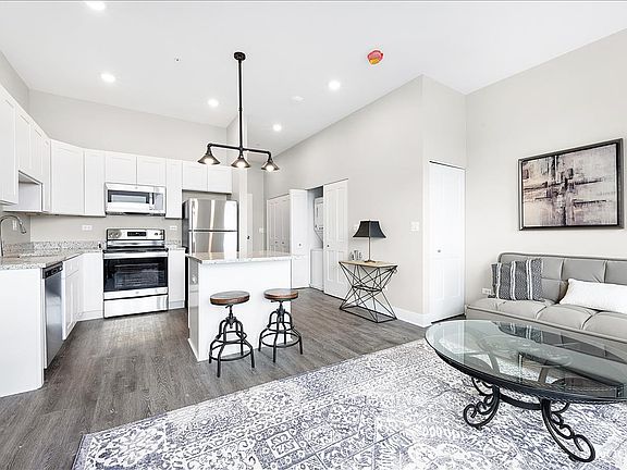 Kitchen and living space of studio