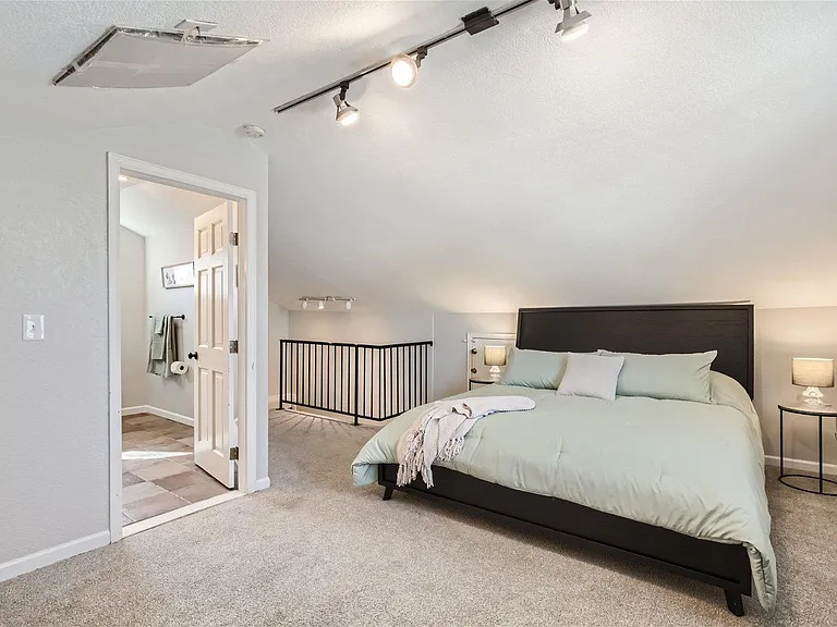 Master bedroom, ensuite bath, king bed, larger closets. Furnished as pictured