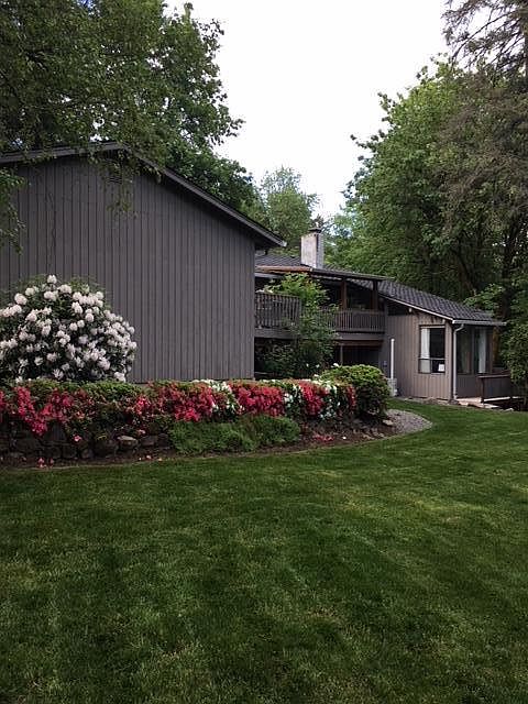 Back yard. Exterior w/ 2 Decks: Main home above and mother-i
