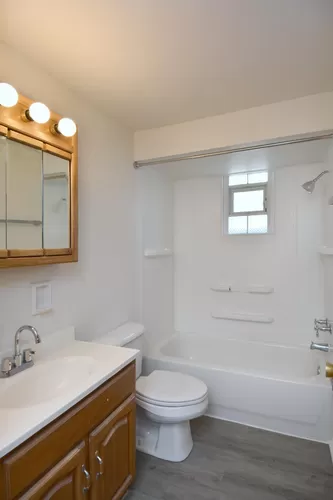 Bathroom with new LVT flooring. - 3151 Glendale Ave #1