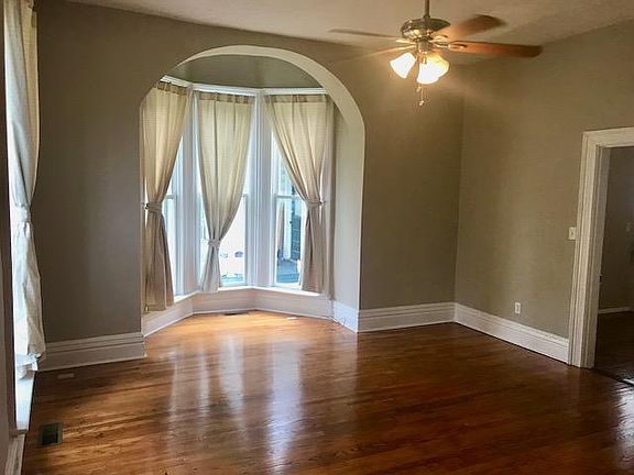 Living room with beautiful bay windows
