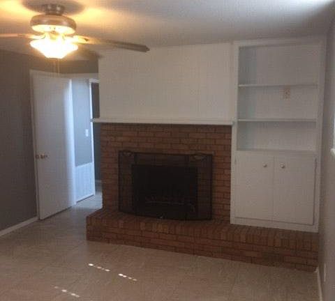 Downstairs living area with fireplace