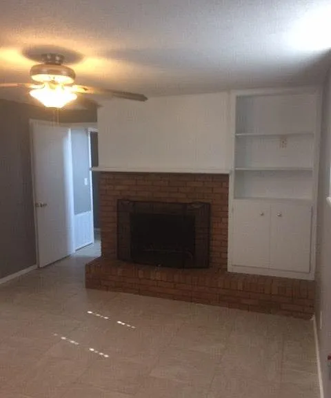 Downstairs living area with fireplace