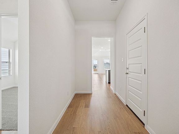 Entryway in the Pinehurst home plan by Trophy Signature Homes - REPRESENTATIVE PHOTO