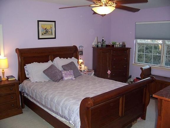 Large master bedroom with private bath and walk-in closet.