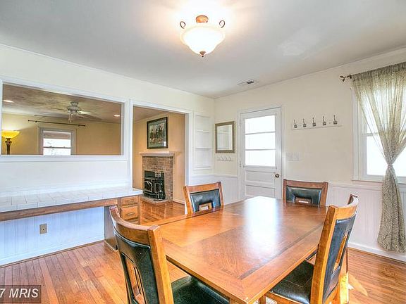 Door Leads Out To 2 Car Carport