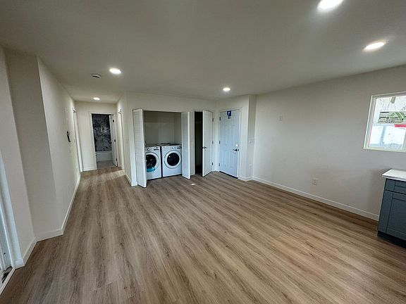 Open floor plan. Brand new washer and dryer, next to hall closet.