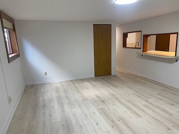 Great room with good light and storage.