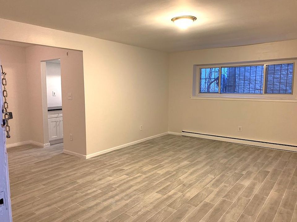 Partial view of kitchen and living room from Entryway