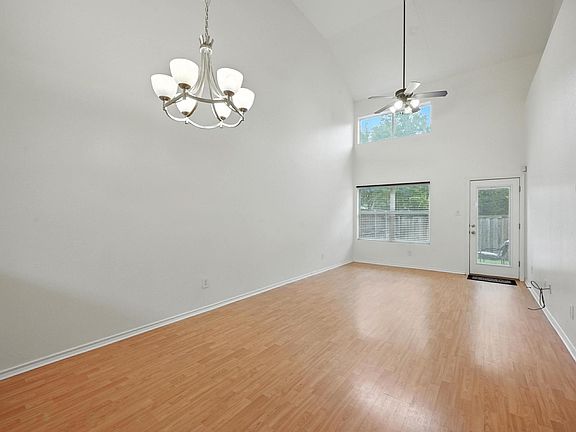 Two story south facing windows in living room
