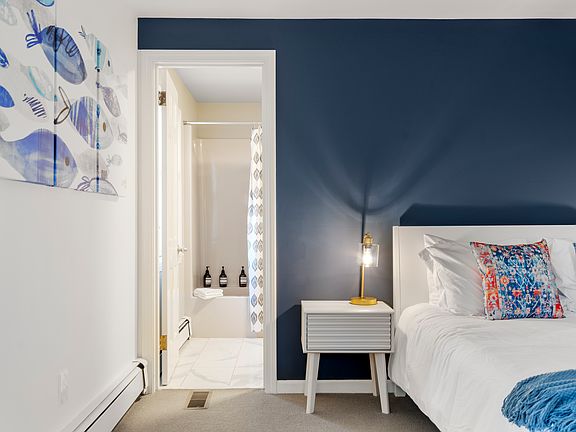 There is even a connecting door to the hallway bathroom in this room to make it more convenient throughout your stay.