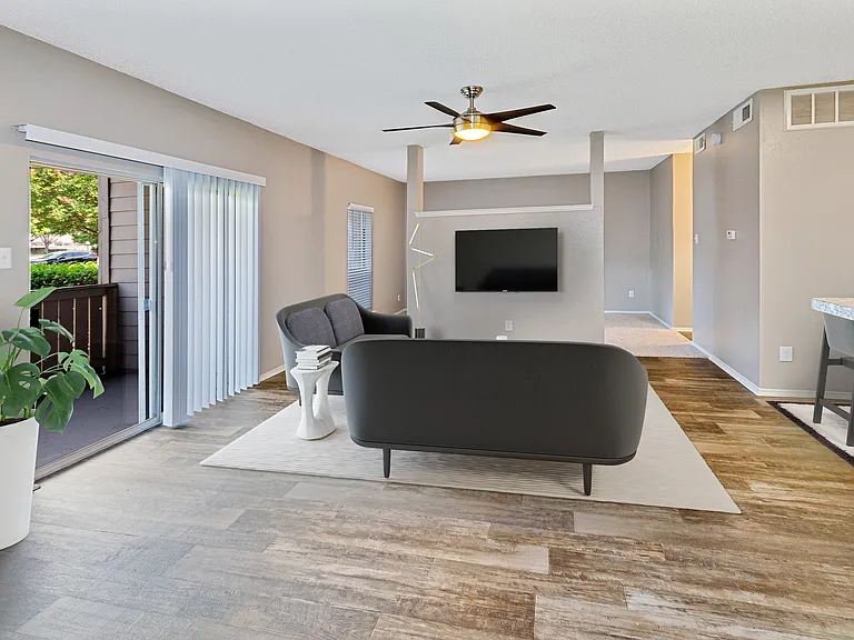 Bright Living Room with Private Balcony Access