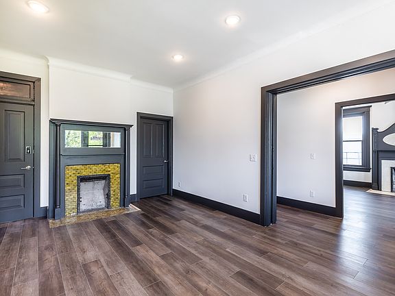 Entry from great room to primary suite.