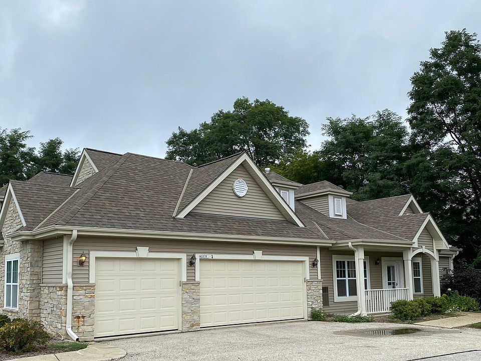 First floor condo with 3 car garage