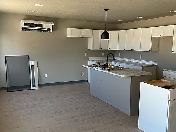 THE WHITE CABINET WILL BE REMOVED