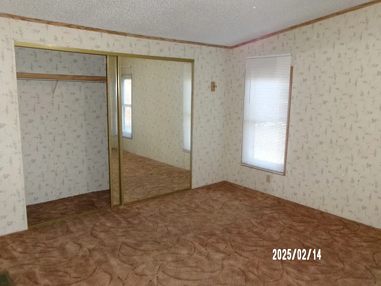 Master bedroom. Bath being painted.