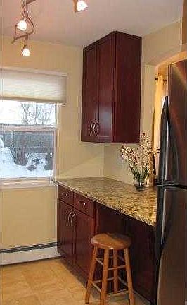 Kitchen side of the breakfast bar.