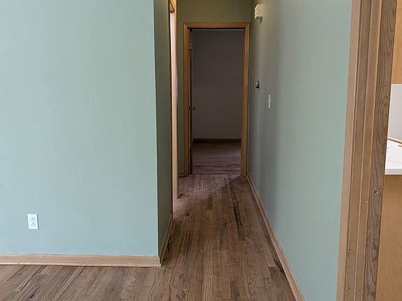 Hallway, 1st bath on left, bedroom 2 straight ahead.