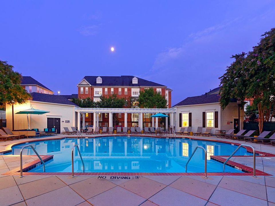 Courtyard with swimming pool, sundeck with lounge seating