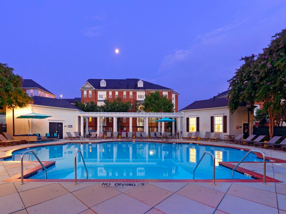 Courtyard with swimming pool, sundeck with lounge seating