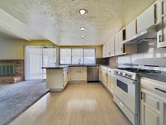 Kitchen workspace overlooking the backyard.