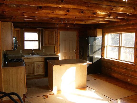 Kitchen with island and breakfast bar