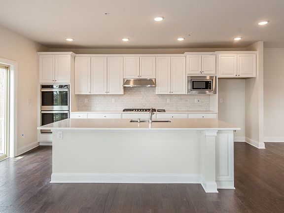 Large center island with additional barstool seating