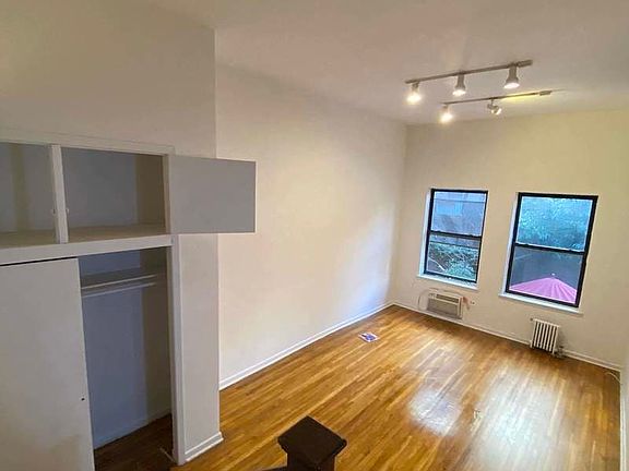 5th image of 221 E 12th St APT 4