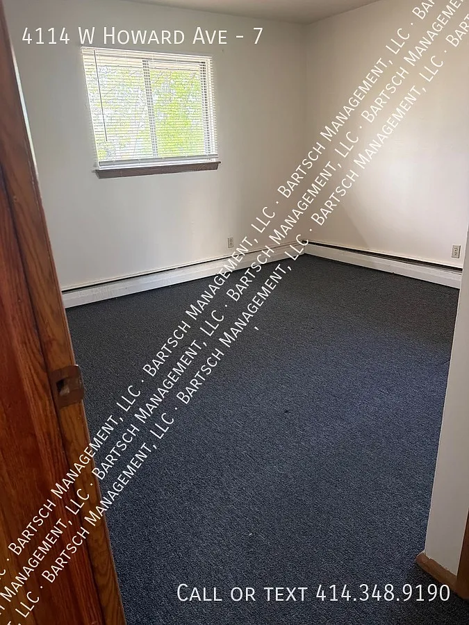 Building Photo - 4114 W Howard Ave #7