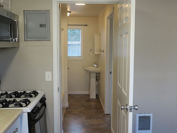 View from kitchen into the bathroom.