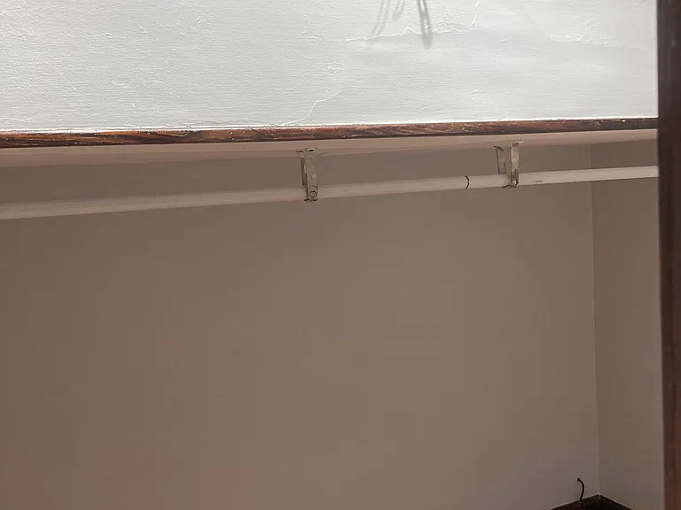 Master bedroom closet from closet door