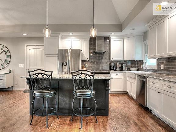 Vaulted ceilings in dining room and kitchen.