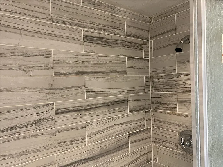 Walk in shower in the primary bathroom
