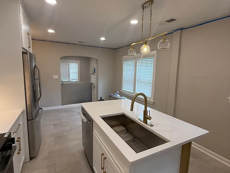 Dishwasher and sink in island