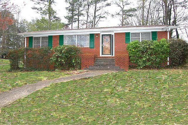 Classic four sided brick home on a large corner lot.