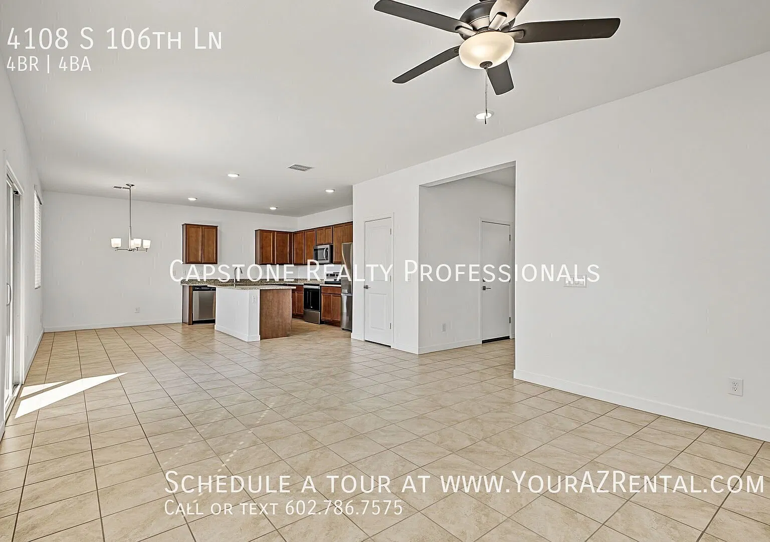Your Next Chapter Starts Here: A 4 Bed, 3.5 Bath Beauty in Tolleson! — Photo 2