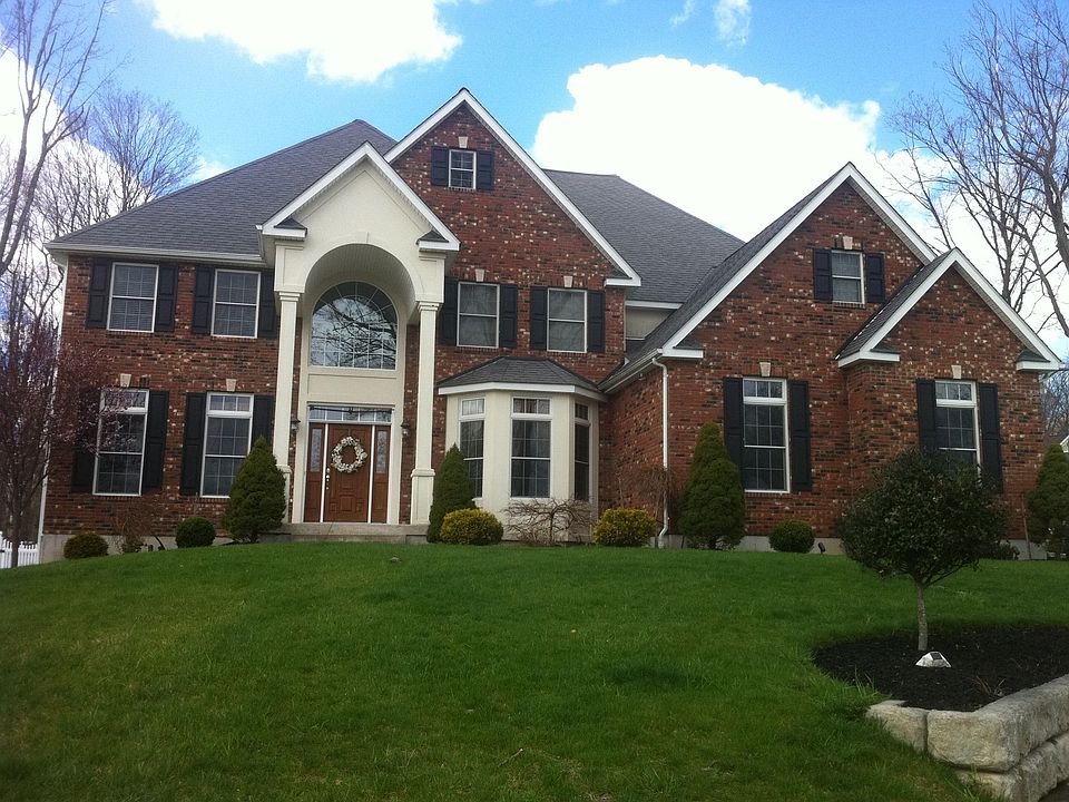 Exquisite & Fully Furnished Post Modern Colonial in Legends!