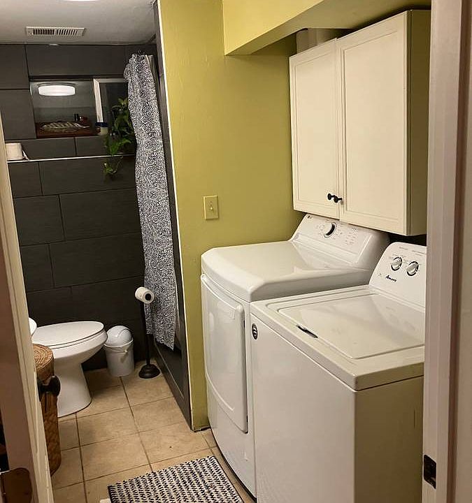 Bathroom with washer and dryer