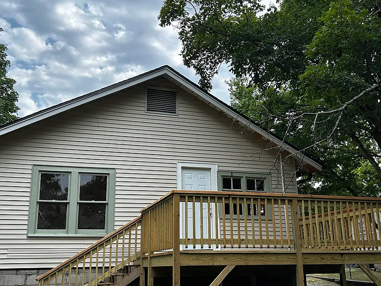 Large, new, rear deck off kitchen