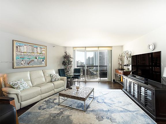2nd image of 3500 Mystic Pointe Dr APT 1607