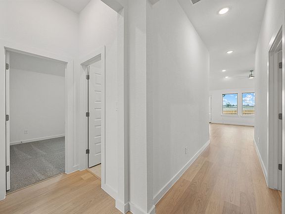 Entry in the Brazos home plan by Trophy Signature Homes - REPRESENTATIVE PHOTO