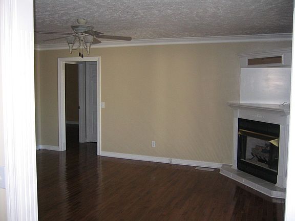 Living room/den with gas fireplace