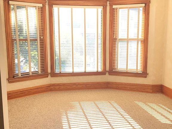 sunny family room, adjacent to living room