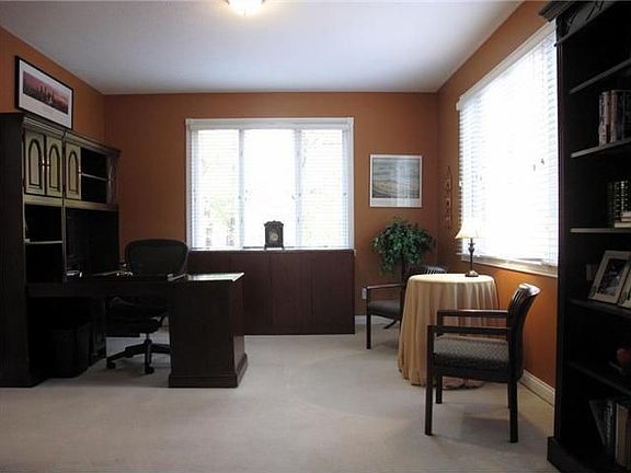 Den: Main-Level Den perfect for those who need a Home Office. 