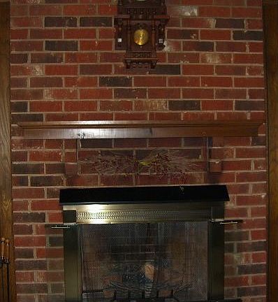 Large brick gas log fireplace